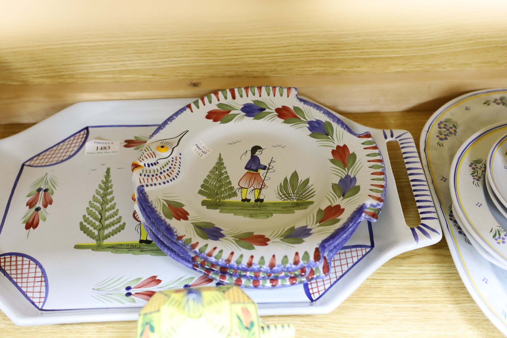 A collection of French Quimper tablewares